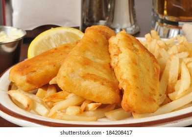 Closeup Of Beer Battered Fish Sticks With French Fries