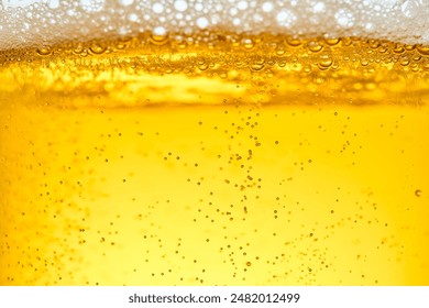 Close-up of beer being poured into a glass - Powered by Shutterstock