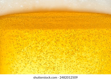 Close-up of beer being poured into a glass - Powered by Shutterstock