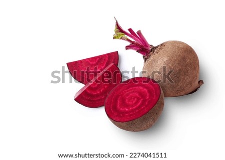 Closeup beetroot (beet root) and cut in half sliced isolated on white background. Top view. Flat lay.