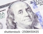 Close-up of Benjamin franklin in dollar paper currency