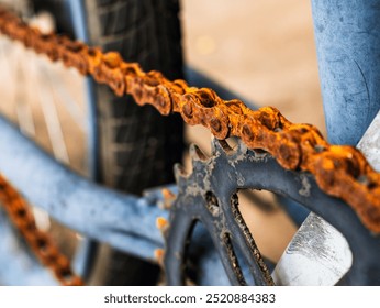 Close-up of The bicycle chain is old and rusty. rusty bicycle chain of old mini bycicle - Powered by Shutterstock