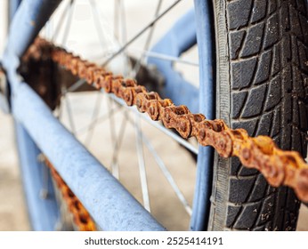 Close-up of The bicycle chain is old and rusty. rusty bicycle chain of old mini bycicle - Powered by Shutterstock