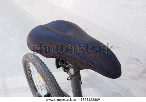 Closeup of a bicycle\
saddle. Bicycle seat.