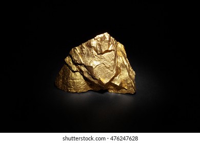 Closeup Of Big Gold Nugget On A Black Background