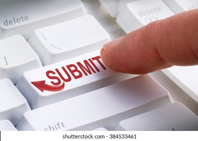 Closeup of a big SUBMIT button on a keyboard with a finger getting ready to hit it and make a online submission.