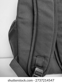 Close-up of black backpack side pocket