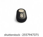 A close-up of a black Bluetooth camera remote with white buttons for camera,Wireless Remote control for DSLR camera. Isolated on white background