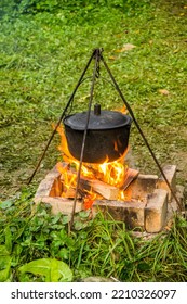 Close-up Of The Black Cauldron On Campfire