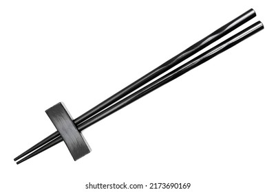 Close-up of black chopsticks isolated on white background - Powered by Shutterstock