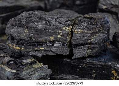 Closeup Of Black Coal Lumps. Fossil Fuel, Air Pollution And Coal Mining Industry Concept.