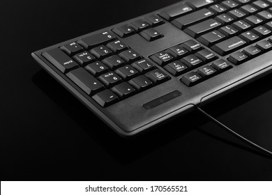 Close-up of Black Computer keyboard on black background