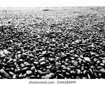 Close-Up of Black Pebbles on Iceland’s Black Sand Beach - Powered by Shutterstock