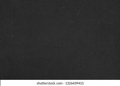 Close-up black polyester synthetic cloth textured, fabric surface abstract background