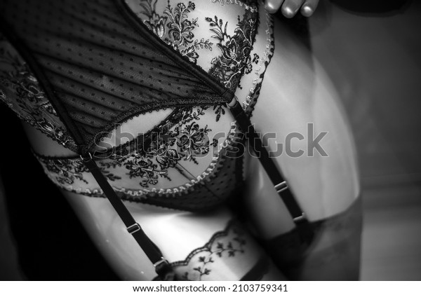 closeup of black Suspender belt underwear on\
mannequin in fashion store for women\
