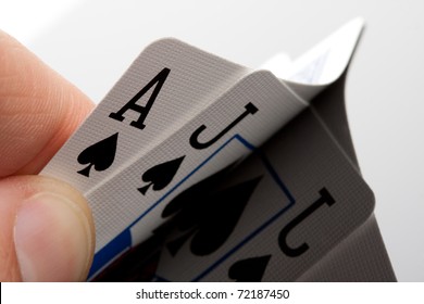 Close-up Of Blackjack Cards In Palm Of Hand