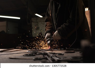 Close-up - Blacksmith Working Process. The Concept Of Blacksmith Production And Hard Physical Work