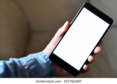 close-up of a blank mobile phone screen - Shutterstock ID 1917061007