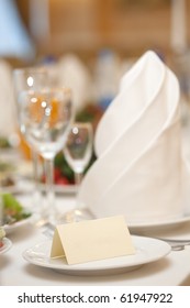 A Closeup Of A Blank Wedding Placecard On Ceramic White Plate