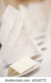 A Closeup Of A Blank Wedding Placecard On Ceramic White Plate