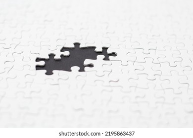 Close-up Of Blank White Puzzle Texture Background