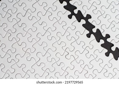 Close-up Of Blank White Puzzle Texture Background