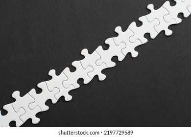 Close-up Of Blank White Puzzle Texture Background