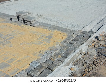 A Close-up Of A Block Footpath Paving, Paver Edging And Pavers Installation, Building A Paver Walkway. 