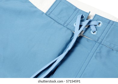 Closeup Of A Blue Boardshorts On A White Background