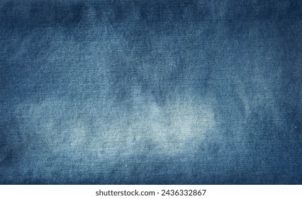 Close-up of blue denim jeans fabric texture background
