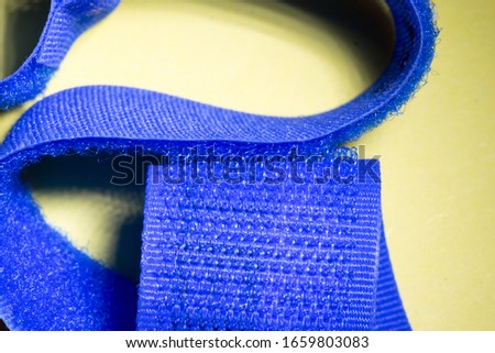 Closeup of a blue hook-and-loop fastener  