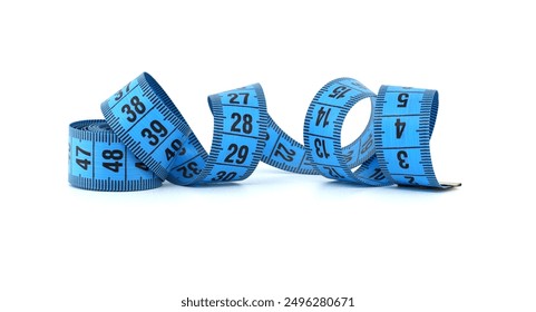 Close-up of a blue measuring tape curled on a white background symbolizing fitness, measurement, and precision. - Powered by Shutterstock