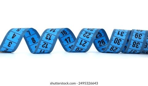 Close-up of a blue measuring tape isolated on a white background, displaying measurements in numbers. Ideal for fitness, sewing, and weight loss concepts. - Powered by Shutterstock