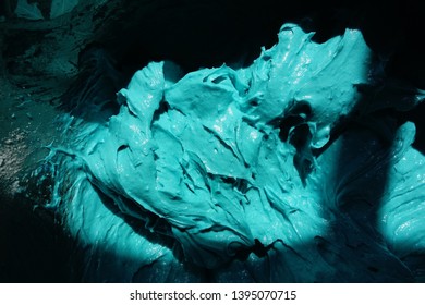 A Close-up Of Blue Velvet Cake Batter In A Bowl