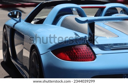 Closeup of blue vintage sports car. 