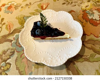 Close-up Of Blueberry Cheesecake, Cheesecake Texture Made From Cream Cheese, Yoghurt, Chicken Eggs, Blueberry Jam, Crunchy Vanilla Cookie Cake Base