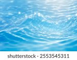 Closeup blurred blue sea background, top view surface blue water. abstract summer background.