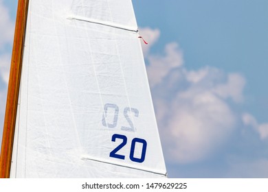 Closeup Of Boat Sails Filled In The Wind