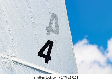 Closeup Of Boat Sails Filled In The Wind