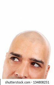 Close-up Of Bold Man Looking Up Over White Background