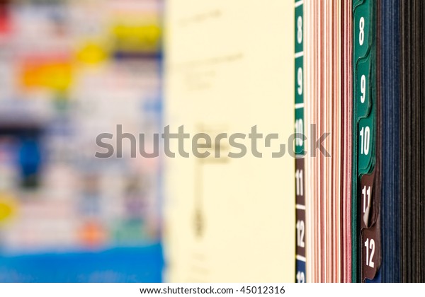 Closeup of book with colored\
tabs