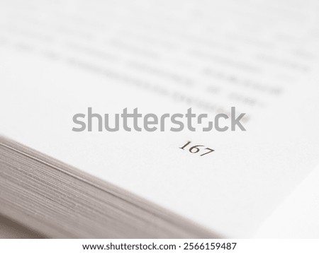 Close-up of a book page capturing text. Ideal image for literature, reading and education themes.