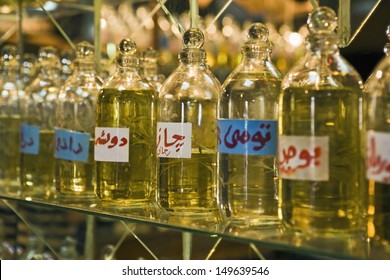 Closeup Of Bottles Of Essential Oils Used In Perfume Making Displayed In A Row