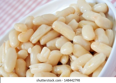 Closeup Of A Bowl With Cooked White Beans