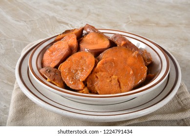 Closeup of a bowl of homemade candied yams