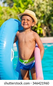 Close-up Of Boy With Inflatable Ring, Pool Noodle