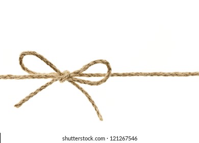 Closeup of braided twine tied in a bow knot isolated on white background