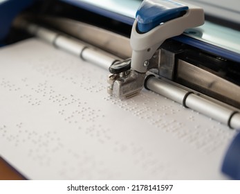 Close-up of a braille code printing machine.  - Powered by Shutterstock