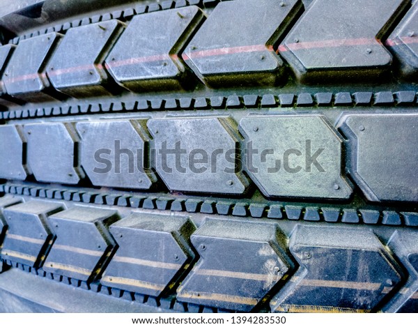 closeup of a brand\
new tire at tire warehouse\
