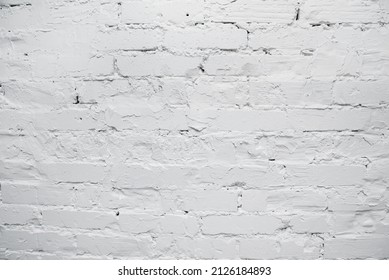 Close-up of a brick wall. Frontage wall in the interior of white brick. White brick background.